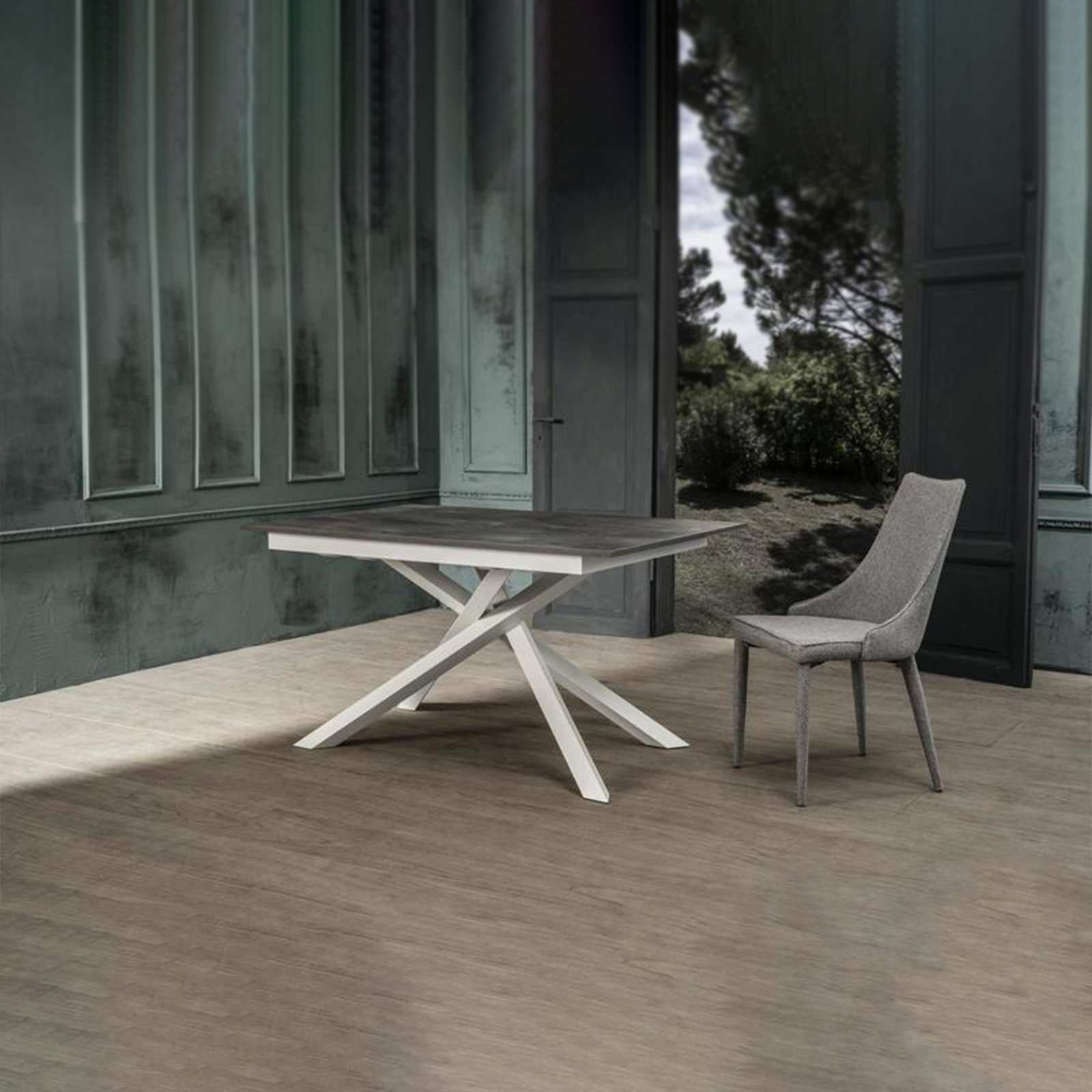 Tavolo moderno allungabile "Atene" con piano melaminico e gambe in metallo verniciato