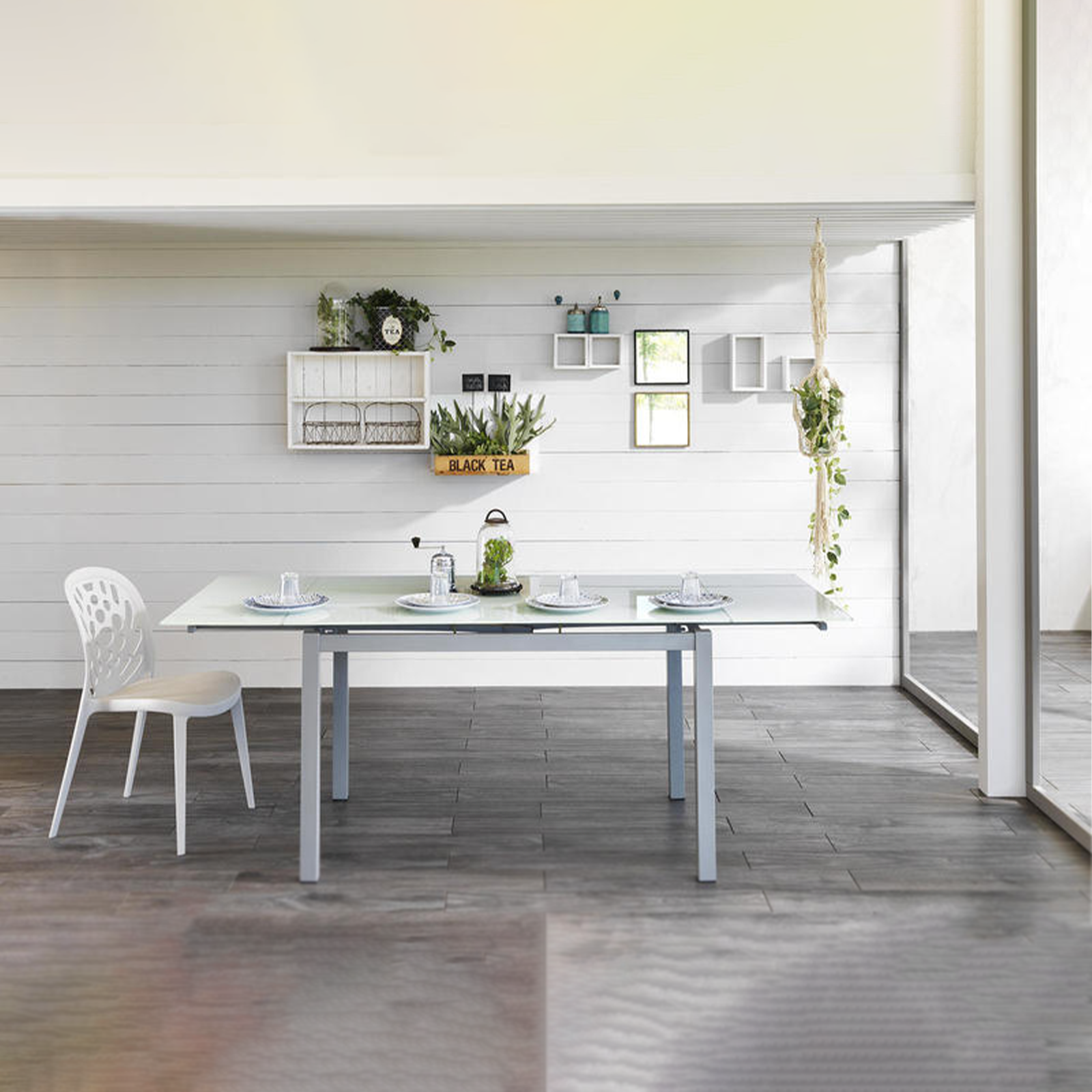 Tavolo allungabile "Bali" piano in vetro temperato gambe in metallo