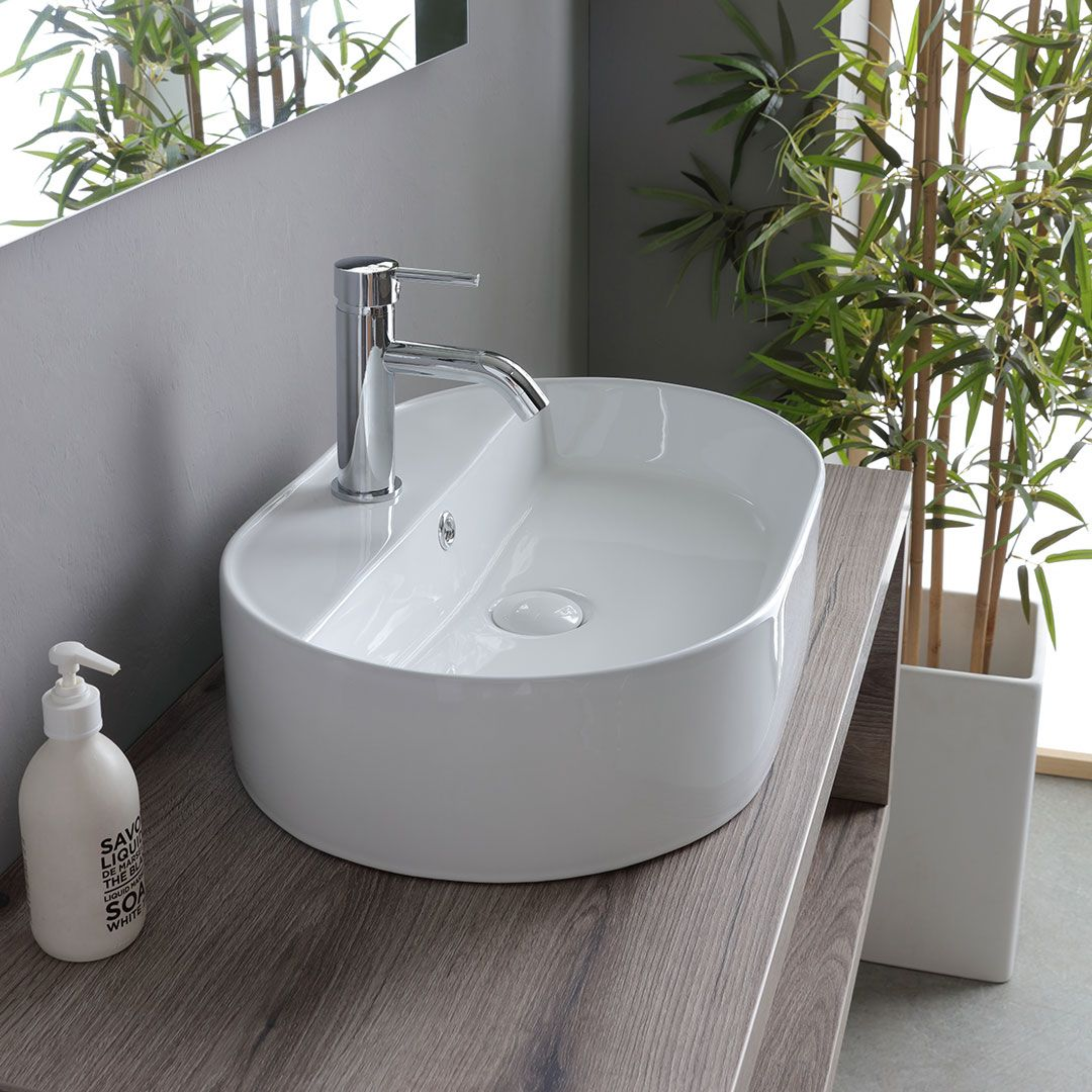 Mobile bagno sospeso rovere fossile "Kos" 100 cm con lavabo ovale bianco in ceramica e specchio rettangolare