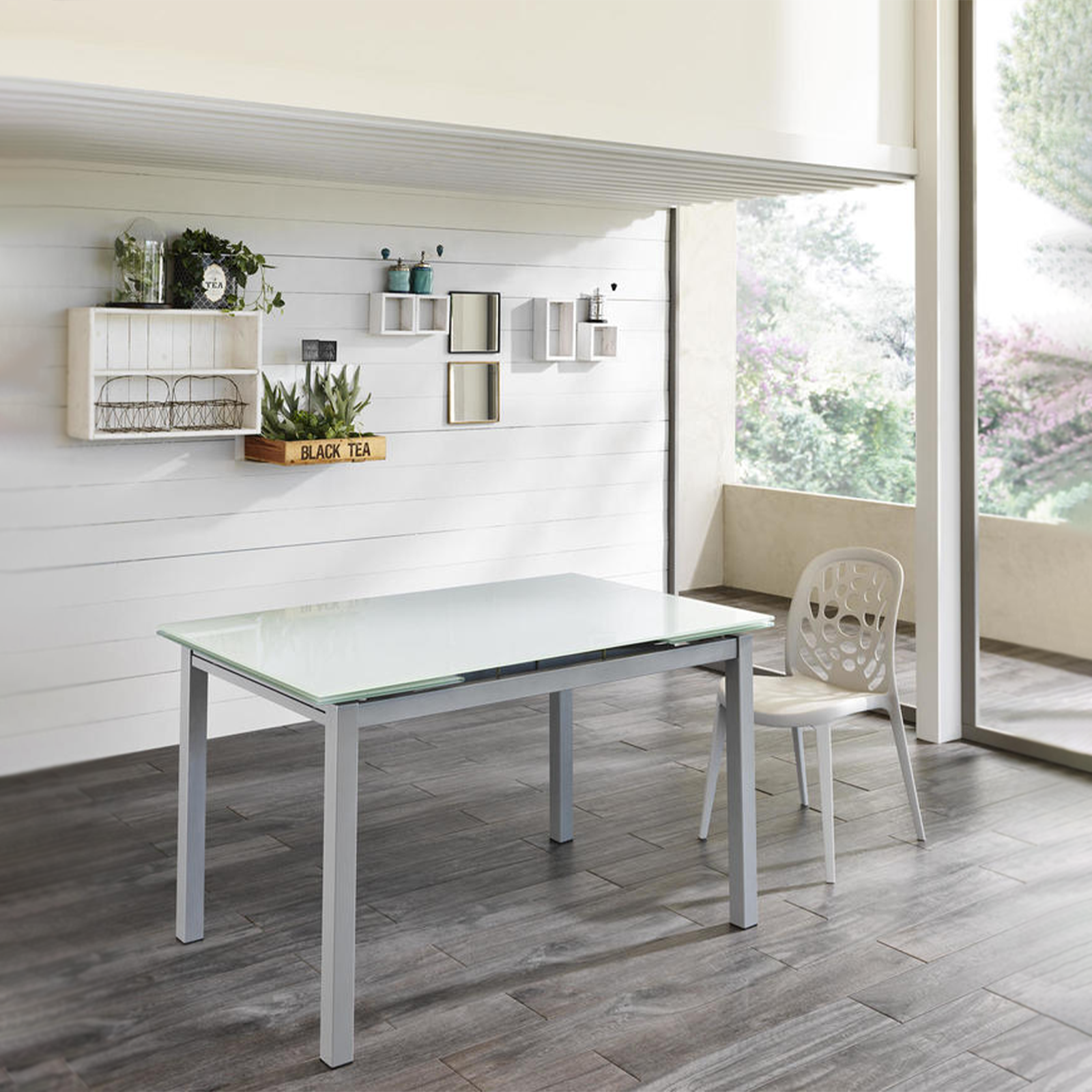 Tavolo allungabile "Bali" piano in vetro temperato gambe in metallo